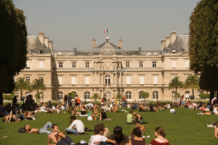 France, Paris, people relaxing in garden of Luxembourg Palace