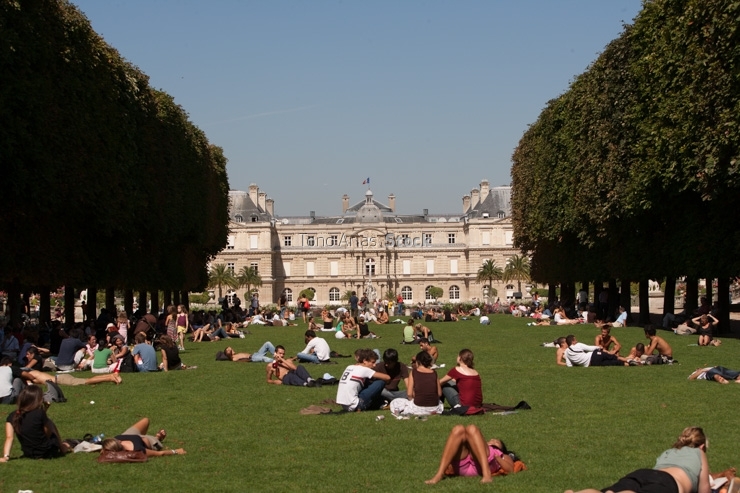 France, Paris, people relaxing in garden of Luxembourg Palace